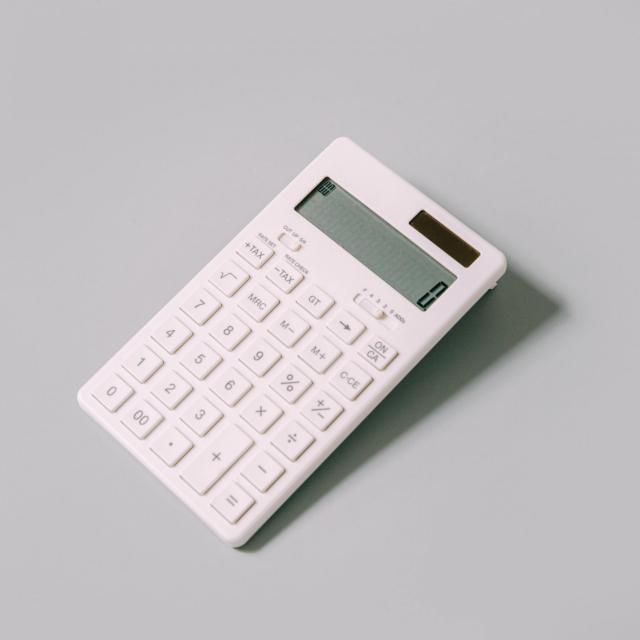 Calculator on a grey desk