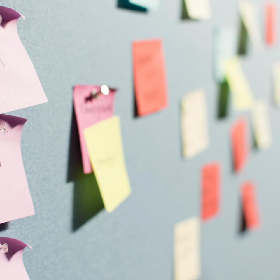 Bulletin Board with various sticky notes