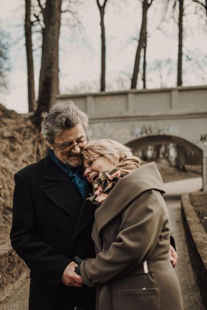 Older couple hugging 